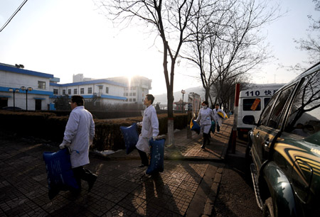 Medical workers prepare to treat survivors in north China's Shanxi Province, Feb. 22, 2009. 