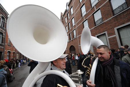 Musicians wait for the parade in the first day of carnival celebration in Binche, about 50 km south of Brussels, capital of Belgium Feb. 22, 2009. Binche's three-day carnival is one of most famous carnival in Europe.[Wu Wei/Xinhua]