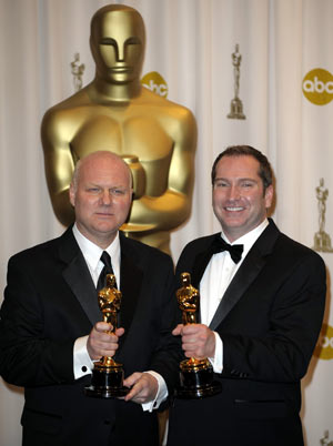 Donald Graham Burt and Victor J. Zolfo pose with their trophies for best art direction of the 81st Academy Awards for 'The Curious Case of Benjamin Button' at the Kodak Theater in Hollywood, California, the United States, Feb. 22, 2009.[Qi Heng/Xinhua]