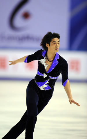 China's Xu Ming competes during the men's individual finals of figure skating at the 24th World Winter Universiade in the Harbin International Conference, Exhibition and Sports Center Gym in Harbin, capital of northeast China's Heilongjiang Province, Feb. 22, 2009. Xu Ming claimed the title in the event. (Xinhua/Yang Zongyou)
