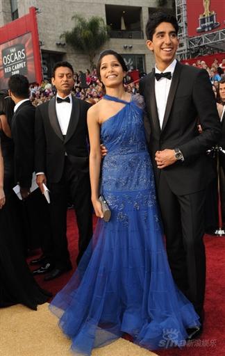 Freida Pinto and Dev Patel co-stars in the Oscar-nominated best film 'Slumdog Millionaire,' arrives for the 81st Academy Awards Sunday, Feb. 22, 2009, in the Hollywood section of Los Angeles.