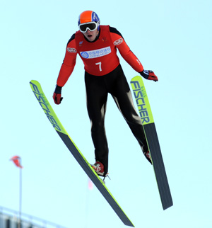 Michail Barinov of Russia competes during k90m ski jumping of Nordic Combined team competition in the 24th World Winter Universiade at the Yabuli Ski Resort 195km southeast away from Harbin, capital of northeast China's Heilongjiang Province, Feb. 22, 2009. Russia won the bronze in the team event. [Xu Yu/Xinhua] 