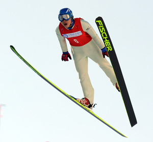  Nagai Takehiro of Japan competes during K90m ski jumping of Nordic Combined team competition in the 24th World Winter Universiade at the Yabuli Ski Resort 195km southeast away from Harbin, capital of northeast China's Heilongjiang Province, Feb. 22, 2009. Japan won the title. [Xu Yu/Xinhua] 