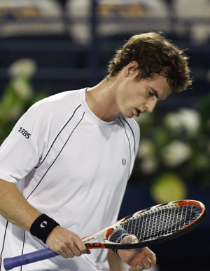 Andy Murray of Britain reacts during his match against Sergiy Stakhovsky of Ukraine at the ATP Dubai Tennis Championships Feb. 23, 2009. [Xinhua/Reuters]