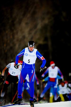 Petr Kutal (Front) of Czech competes during the 10km cross country race of Nordic combined mass start competition in the 24th Winter Universiade at the Yabuli Ski Resort 195km southeast away from Harbin, capital of northeast China's Heilongjiang Province, Feb. 24, 2009. Petr Kutal took the bronze of the mass start event with 223.4 points. (Xinhua Photo) 