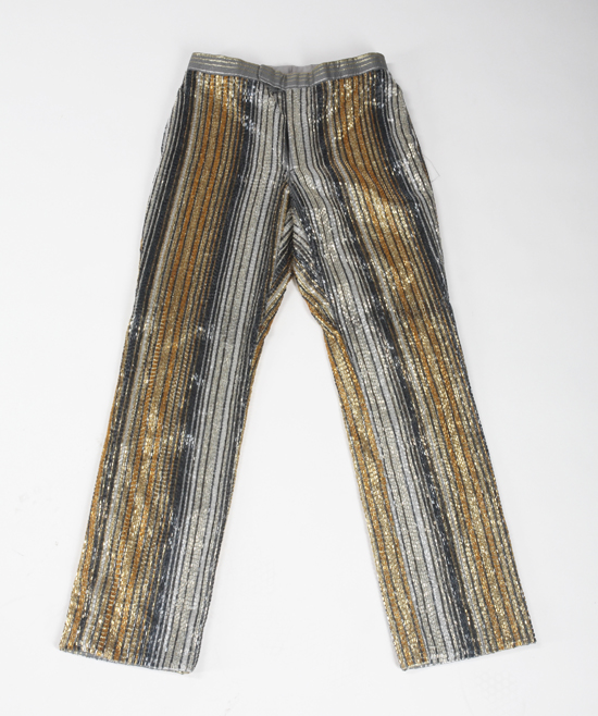 A custom designed pair of costume pants worn by Michael Jackson during the 1984 Victory Tour with The Jacksons. The pants have zip and front tab closure and are completely covered in clear, silver, gold and marcasite bugle beads. Estimate: $100 - $150 [China.org.cn/Julien's Auctions/Shaan Kokin] 
