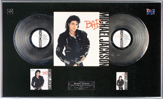 An platinum record award presented to Michael Jackson for double platinum record, cassette and cd sales of 'BAD' by CBS Records Australia November 1987. Estimate: $100 - $150 [China.org.cn/Julien's Auctions/Shaan Kokin] 