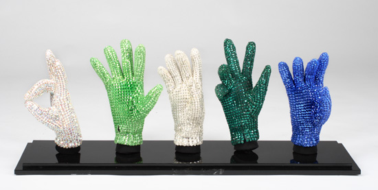 A custom display of Michael Jackson's signature crstyal glove in five different colors. 