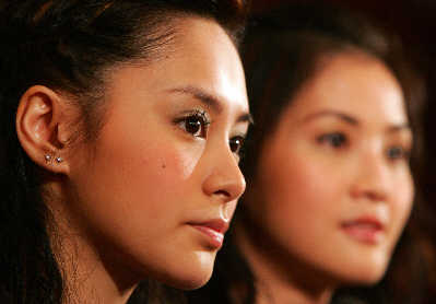 Gillian Chung (left) is seen in this undated file photo with another Twins member Charlene Choi. 