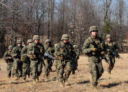 Members of The Basic School (TBS) of U.S. Marine Corps take part in a training at a military base in Quantico, Virginia State of the United States of America, Feb. 26, 2009. The function of TBS is to provide battle skills and tactics' trainings for new Marine Corps' officers or the undergraduates who will join the U.S. Marine Corp. (Xinhua/Jiang Guopeng)