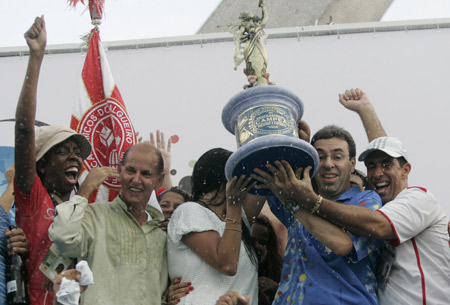 Members of the Salgueiro samba school celebrate after winning the 2009 Carnival title at the Sambadrome in Rio de Janeiro, February 25, 2009. 