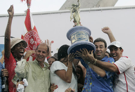 Members of the Salgueiro samba school celebrate after winning the 2009 Carnival title at the Sambadrome in Rio de Janeiro, February 25, 2009.