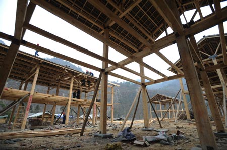 Photo taken on Feb. 11, 2009 shows the main structure of some permanent housing which had been finished at Guanzhuang Township in Qingchuan County, southwest China's Sichuan Province.