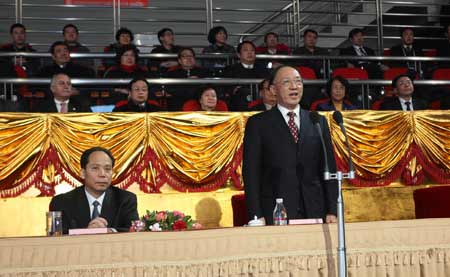 Liu Peng (Front R) , director of the General Administration of Sports of China declares the games close during the closing ceremony of the 24th World Winter Universiade in Harbin, capital city of northeast China's Heilongjiang Province, Feb. 28, 2009. 