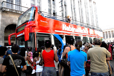 A double-decker bus made by a Chinese producer runs in Havana, Cuba, Feb. 28, 2009.