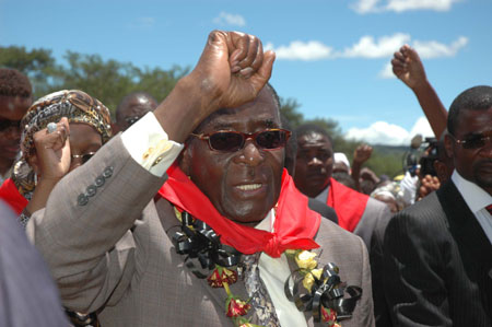 Zimbabwean President Robert Mugabe attends his birthday party in Chinhoyi, west Zimbabwe, Feb. 28, 2009.