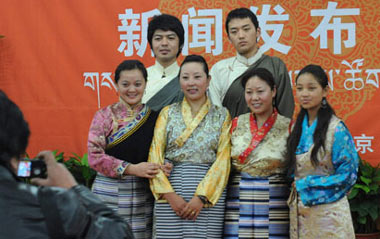 Working staff members of the Tibetan language frequency of China National Radio (CNR) takes group photo after a press conference in Beijing, China, on Feb. 28, 2009. Tibetan language frequency is the 11th, and the latest established frequency of CNR. It will start broadcasting on March 1, 2009, with 18 hours programs one day.