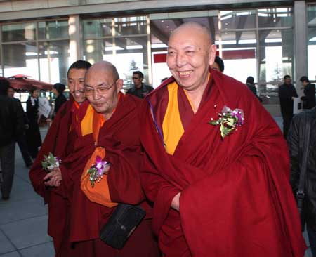 Members of the 11th National Committee of the Chinese People's Political Consultative Conference (CPPCC) from southwest China's Tibet Autonomous Region arrive in Beijing, capital of China, March 1, 2009.