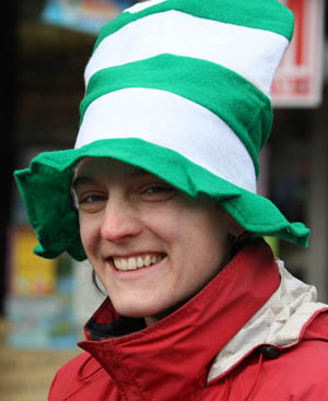 A women wearing a green hat attends the parade in Queens of New York, the United States, on March 1, 2009, to celebrate the upcoming Saint Patrick's Day. Saint Patrick's Day parades are now held throughout not only Ireland but also countries with big emigrant communities like the United States and Britain. The Saint Patrick's Day falls on March 17 annually.