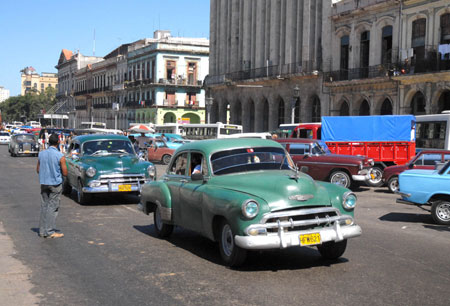 Weckers run in Havana, Cuba, Feb. 28, 2009. In Havana, weckers, trikes, carriages along with buses and taxis compose the city's main public transportation system. These vehicles witnessed the city's development and change.