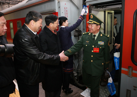 Deputies to the Second Session of the 11th National People's Congress (NPC) from central China's Henan Province arrive in Beijing, capital of China, March 2, 2009. The Second Session of the 11th NPC is scheduled to open on March 5. 