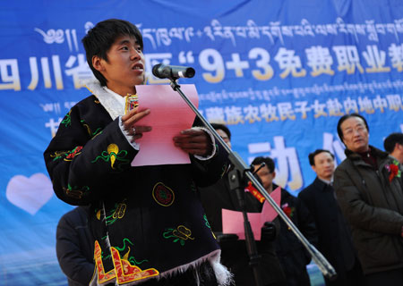 Tibetan student from Danba addresses a gathering in Kangding County, capital of the Ganzi Tibetan Autonomous Prefecture, southwest China's Sichuan Province, on March 2, 2009. A program providing free vocational education for kids of Tibetan farmers or herdsmen was launched and 300 of them from 18 counties of the prefecture will start studying at vocational schools in more developed areas of Sichuan Province. [Xinhua]