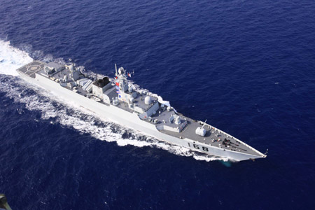 Photo taken from a helicopter shows China's destroyer 'Guangzhou' sailing in the Indian Ocean on the way to Pakistan March 2, 2009. A Chinese naval task force including destroyer 'Guangzhou' and a helicopter will attend the 'Peace-09' exercise in the seas off Pakistan. The task force on Monday conducted a training session of the helicopter. 