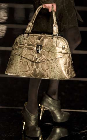 A model presents a creation by British designer John Richmond during his Fall/Winter 2009/10 women's collection show at Milan Fashion Week March 2, 2009. 