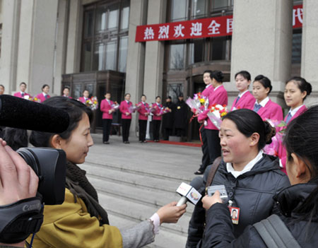 A deputy to the Second Session of the 11th National People's Congress (NPC) from Tibet is interviewed by reporters in Beijing, March 2, 2009. The Second Session of the 11th NPC is scheduled to open on March 5. 