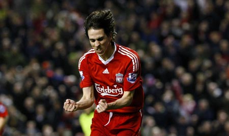 Liverpool's Yossi Benayoun celebrates after scoring during their English Premier League soccer match against Sunderland in Liverpool, northern England, March 3, 2009.[Xinhua/Reuters]