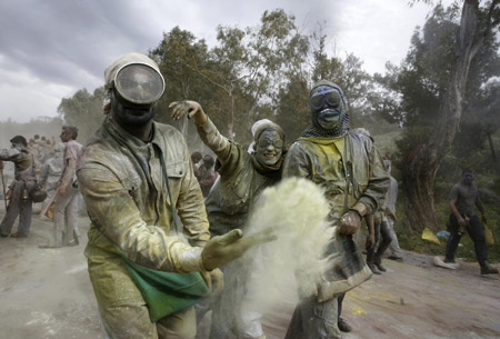 Revellers celebrate Clean Monday by participating in a colorful 'flour-war', a traditional activity marking the end of the carnival season, in the port town of Galaxidi, some 200km (125 miles) northwest of Athens Mach 2, 2009.