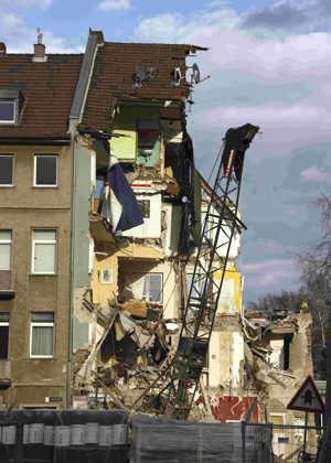 The remains of a house next to where the former town archive of the German city of Cologne collapsed, is pictured in Cologne March 3, 2009.