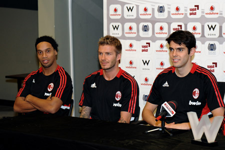 AC Milan's Ronaldinho (L), David Beckham (C) and Kaka attend a press conference of an international friendly game with Al Sadd club at the Hamed Bin Jassin Stadium in Doha, Qatar, March 3, 2009. [Xinhua]