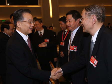 Chinese leaders joined group discussions with the country's political advisors Wednesday,