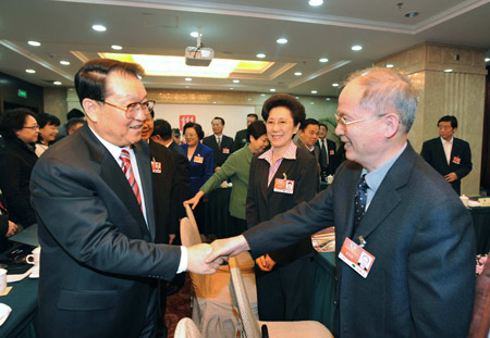 Chinese leaders joined group discussions with the country's political advisors Wednesday,