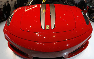 A Ferrari 430 Scuderia is displayed at the Ferrari showcase during the first media day of the 79th Geneva Car Show at the Palexpo in Geneva March 3, 2009.