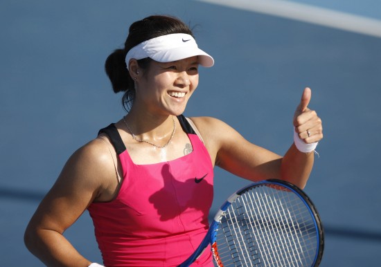 Li Na reacts during her match against Petra Cetkovska of the Czech Republic. [Xinhua]