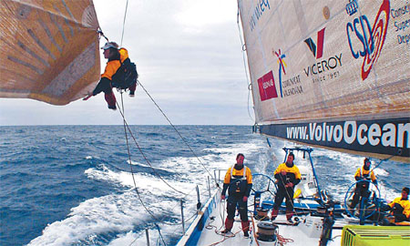 Telefonica Blue's crewman David Vera changes the sail during leg 5 of the Volvo Ocean Race from Qingdao to Rio de Janeiro. [Gabriele Olivo/Telefonica Blue/Volvo Ocean Race]