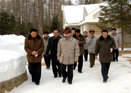 An undated photo released by Korean Central News Agency on March 5, 2009 shows Kim Jong Il (C Front), top leader of the Democratic People's Republic of Korea (DPRK), visiting a revolutionary site in the northern Ryanggang province of the DPRK.