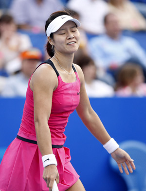 China's Li Na reacts during the singles final against Marion Bartoli of France at the WTA Monterrey Tennis Open, in Monterrey, Mexico, on March 8, 2009. Li Na lost 0-2 (4-6, 3-6) and ranked the second. [Xinhua]