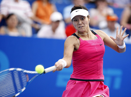 China's Li Na returns the ball during the singles final against Marion Bartoli of France at the WTA Monterrey Tennis Open, in Monterrey, Mexico, on March 8, 2009. Li Na lost 0-2 (4-6, 3-6) and ranked the second. [Xinhua]