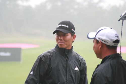 Wu Ashun on the driving range with compatriot Zhang Lianwei at last year's HSBC in Shanghai. [Credit: David Ferguson]