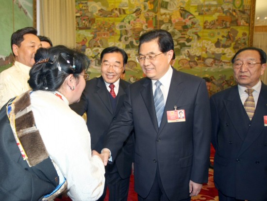 Chinese President Hu Jintao (2nd R) joins a panel discussion with deputies to the Second Session of the 11th National People's Congress (NPC) from southwest China's Tibet Autonomous Region, in Beijing, capital of China, March 9, 2009. (Xinhua Photo)