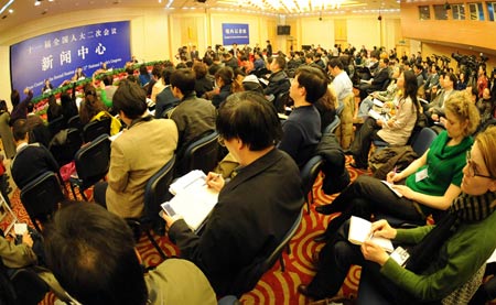 A press conference on post-earthquake reconstruction in southwest China's Sichuan Province, is held by the Second Session of the 11th National People's Congress (NPC) in Beijing, capital of China, March 8, 2009. (Xinhua/Yang Zongyou)