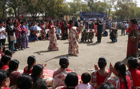 Nepali women in traditional dresses take part in a celebration to mark the International Women's Day in Nepal's capital Kathmandu on March 8, 2009. The main theme of the International Women's Day for Nepal this year is 'Voice of All Nepalis: Drafting Women-friendly Constitution.' 