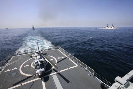 China's navy 'Guangzhou' destroyer is seen at the Arabia Sea off the southern Pakistani port of Karachi, on Mar. 9, 2009. Warships from participating countries Monday began their second phase of the two-week-long AMAN 09 military exercises at the Arabia Sea off the southern Pakistani port of Karachi. 