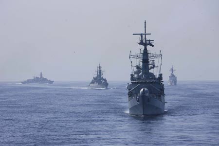 Photo taken on Mar. 9, 2009 shows warships during the AMAN 09 military exercises at the Arabia Sea off the southern Pakistani port of Karachi. Warships from participating countries Monday began their second phase of the two-week-long AMAN 09 military exercises at the Arabia Sea off the southern Pakistani port of Karachi. (Xinhua/Zha Chunming)