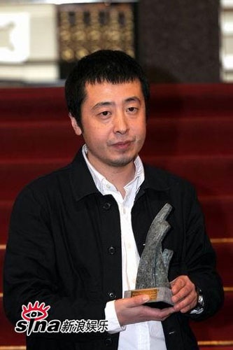 Chinese director Jia Zhangke (R 2) wins Outstanding Artistic Achievement Award with his latest film '24 City' at the 10th annual Las Palmas de Gran Canaria International Film Festival in Spain, March 9, 2009. 