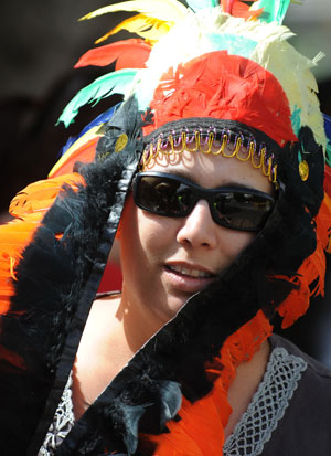 A woman dressed as an Indian attends the annual Purim Festival Parade in Holon, south of Tel Aviv, March 10, 2009. Jewish people celebrated their Purim Festival from March 10 to 11 this year. (Xinhua/Yin Bogu) 