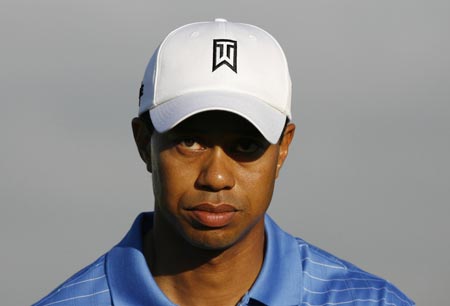 Golfer Tiger Woods of the U.S. looks on during his practice round for the CA Championship at Doral Golf Resort in Miami, March 11, 2009. [Xinhua/Reuters] 